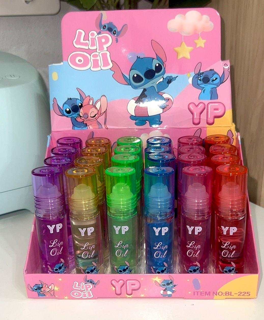 LIP OIL ROLL ON STITCH