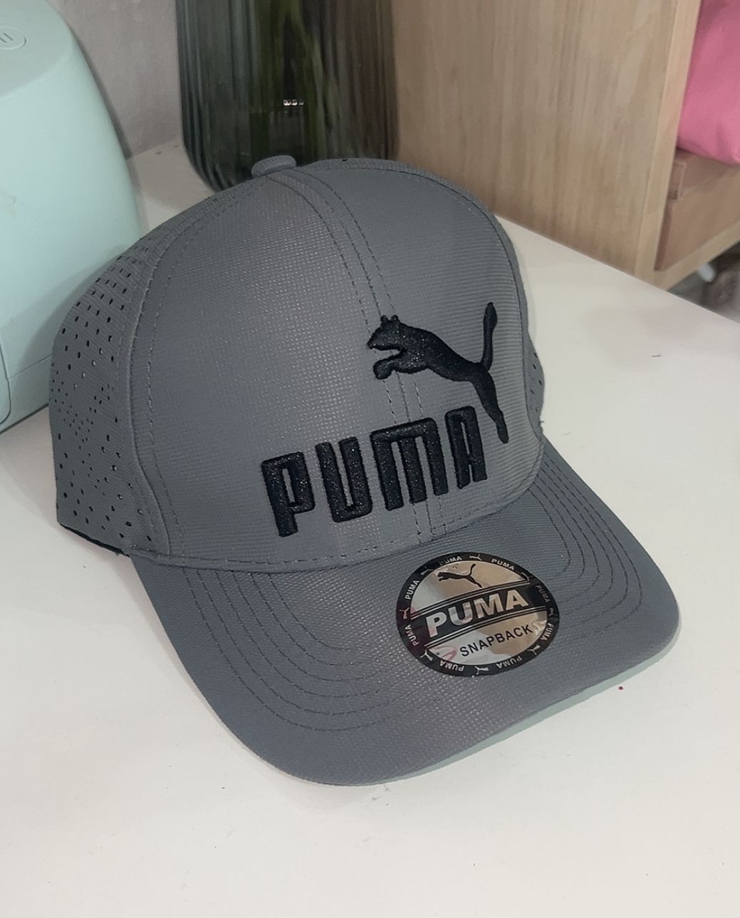 GORRA MARC PUM GRIS